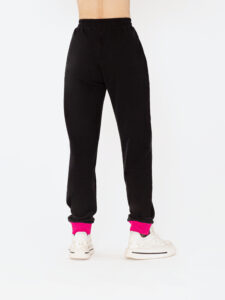 Black joggers with pink cuffs